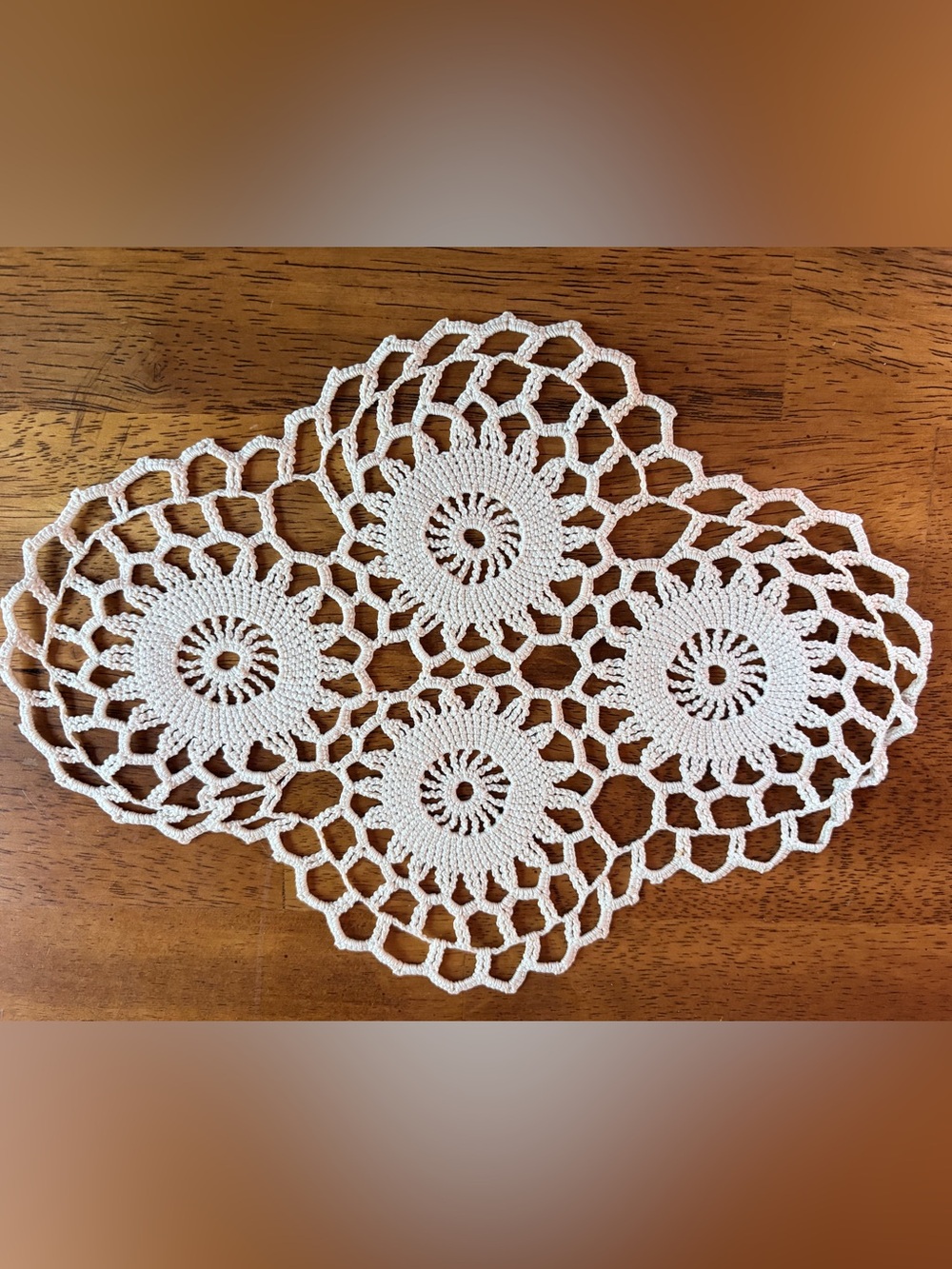 Vintage cream cotton nand crocheted floral oval doily 10 inch by 7 inch